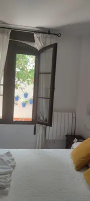 Cama o camas de una habitación en Hotel La Ribera
