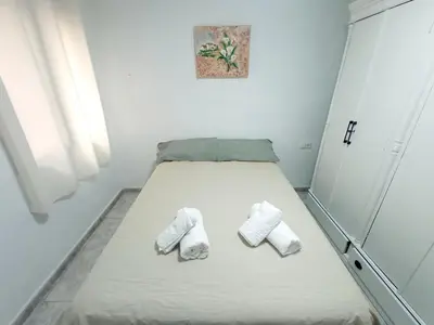 Cama o camas de una habitación en Apartamento HZ Califa