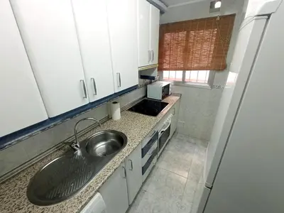 Una cocina o zona de cocina en Apartamento HZ Califa