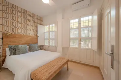Cama o camas de una habitación en Impresionante y lujoso a 5 minutos de la Giralda