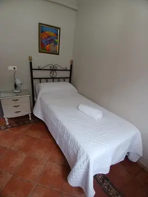 Cama o camas de una habitación en Budget and lovely rooms Macarena B