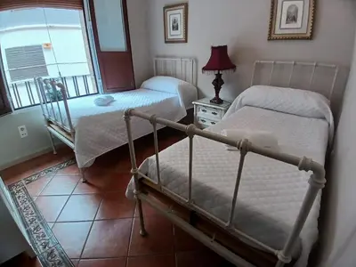 Cama o camas de una habitación en Budget and lovely rooms Macarena B