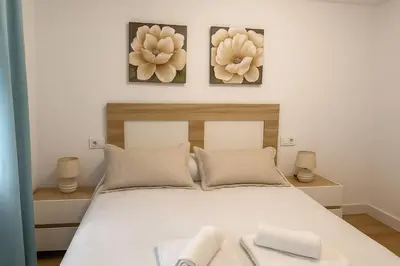 Cama o camas de una habitación en Alojamiento Baeza- El Limonero A