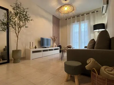 Una televisión o centro de entretenimiento en La Carmela - Casco Histórico con PARKING privado y vistas