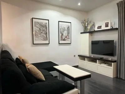 Una televisión o centro de entretenimiento en Casa D'utor