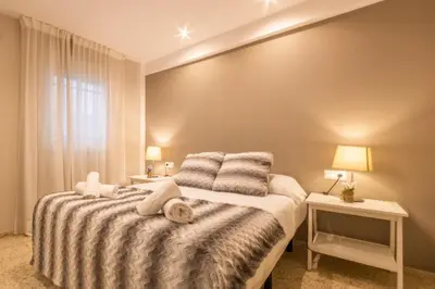 Cama o camas de una habitación en Unika Homes Castellar