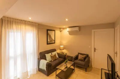 Zona de estar de Unika Homes Castellar