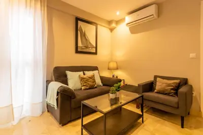 Zona de estar de Unika Homes Castellar