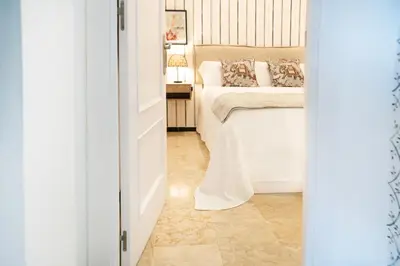 Cama o camas de una habitación en AvantiStays Guadalquivir