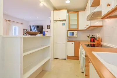 Una cocina o zona de cocina en Apartamento Teide Sevilla - Junto a la alameda