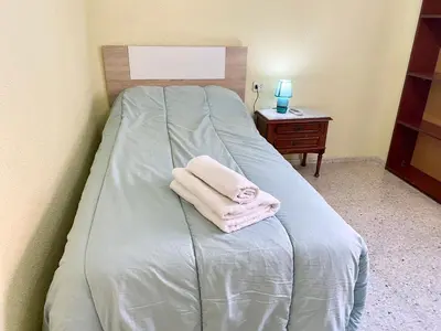 Cama o camas de una habitación en Virgen de Fátima Córdoba