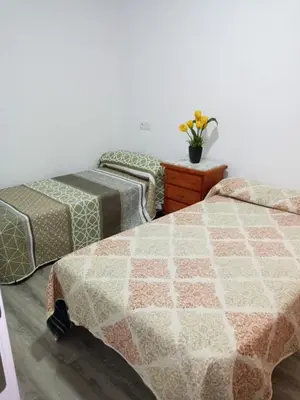 Cama o camas de una habitación en Piso el Camarín