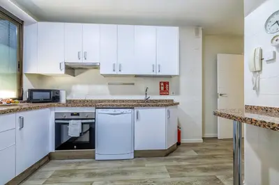 Una cocina o zona de cocina en Apartamento en el Centro con Parking y Terraza