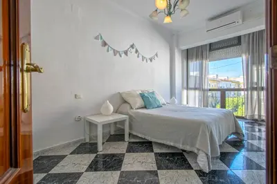 Cama o camas de una habitación en Apartment next to Santa Justa