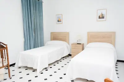 Cama o camas de una habitación en Piso turístico Aranda Paniagua