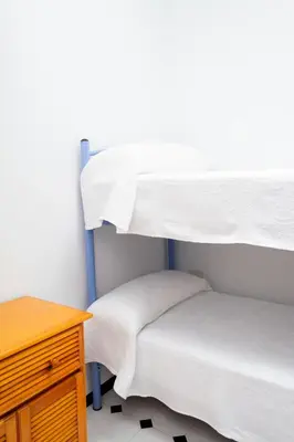 Cama o camas de una habitación en Piso turístico Aranda Paniagua