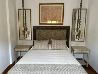 Cama o camas de una habitación en Casa Puerta de Córdoba