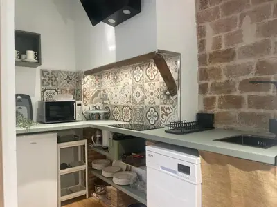 Una cocina o zona de cocina en Hospedería El Reloj 2 bedrooms