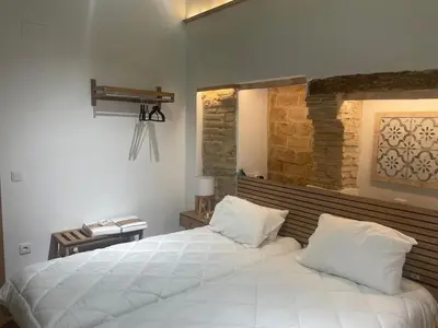 Cama o camas de una habitación en Hospedería El Reloj 2 bedrooms