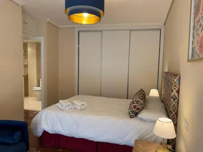 Cama o camas de una habitación en Urban Córdoba Suites