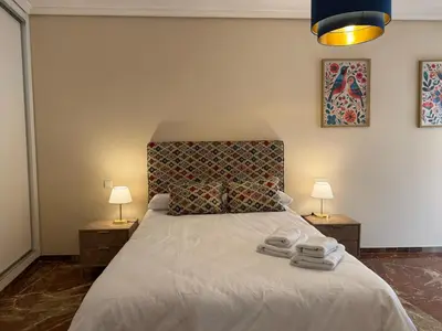 Cama o camas de una habitación en Urban Córdoba Suites