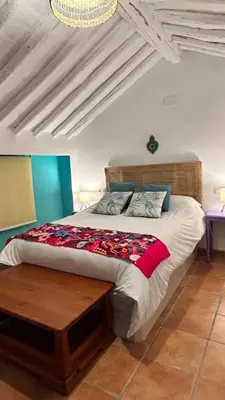 Cama o camas de una habitación en La Casa de los Colores