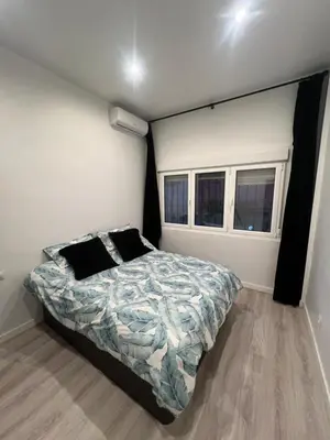 Cama o camas de una habitación en Nuevo apartamento céntrico