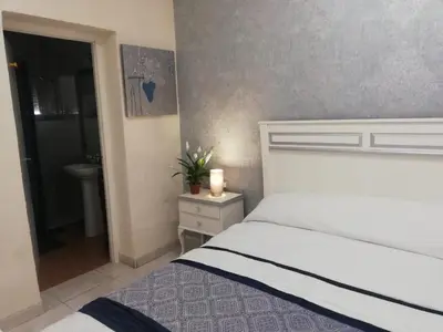 Cama o camas de una habitación en Room Boutique Don Antonio