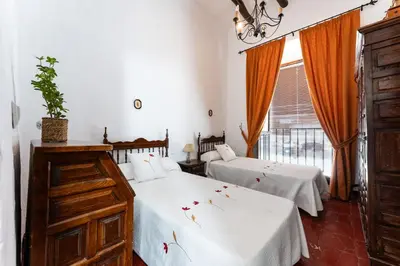 Cama o camas de una habitación en MalagaSuite Bobadilla Casa Rural