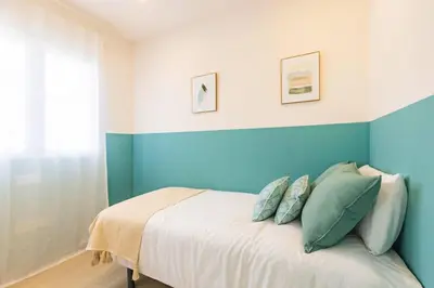 Cama o camas de una habitación en Casa 3 plantas con patio y Solárium privados