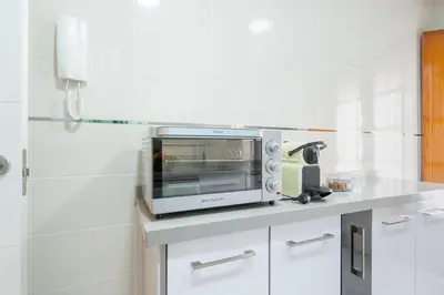 Una cocina o zona de cocina en Panther Home San Roque