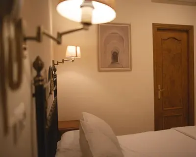 Cama o camas de una habitación en Apartamentos San Fernando 62