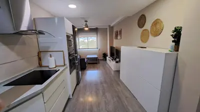 Una cocina o zona de cocina en Apartamentos María Cristina 2, Parking Gratis Vistas Históricas