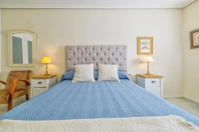 Cama o camas de una habitación en Apto América Center & Parking