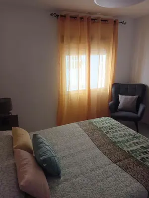 Cama o camas de una habitación en Apartamento AVENIDA