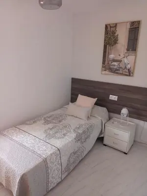 Cama o camas de una habitación en Apartamento AVENIDA