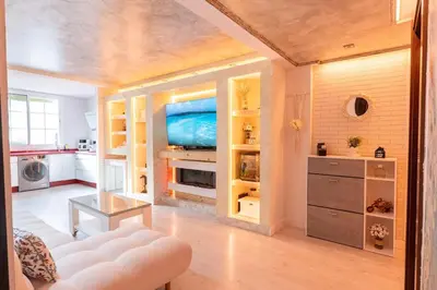 Una televisión o centro de entretenimiento en Lovemar Piso Turistico