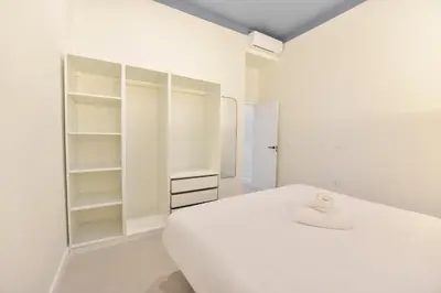 Cama o camas de una habitación en Riverside Suits