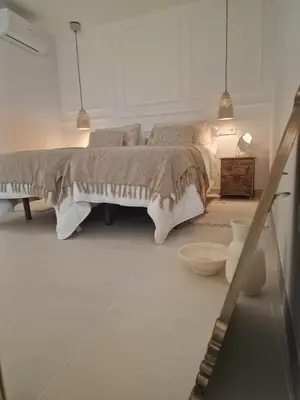 Cama o camas de una habitación en La Posada del Olivar