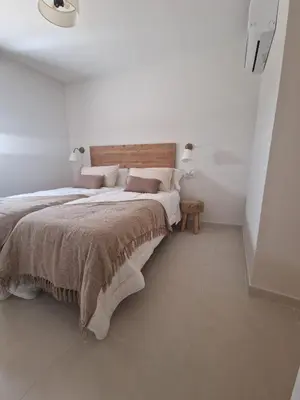 Cama o camas de una habitación en La Posada del Olivar