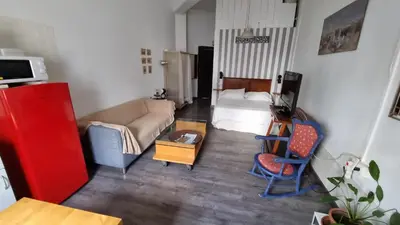 Cama o camas de una habitación en Loft en casco historico Macarena