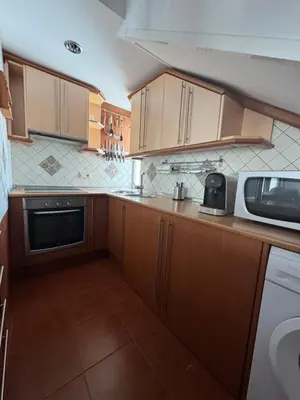 Una cocina o zona de cocina en Alcalá zona centro duplex