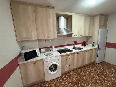 Una cocina o zona de cocina en AVENIDA CENTRO 2 Dormitorios PONDOS