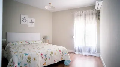Cama o camas de una habitación en Suites Cañizares Catedral
