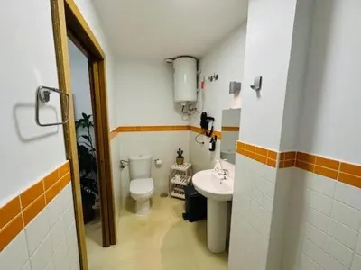 Un baño de Apartamentos Macarena Centro Histórico