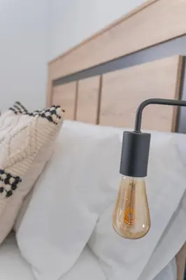 Cama o camas de una habitación en Apartamentos Áurea Casas del Sur