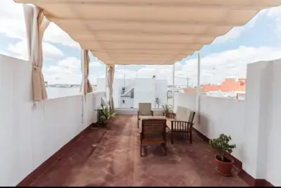 Un balcón o terraza de Refugio Vanguardista Free parking