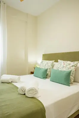 Cama o camas de una habitación en Bustos Tavera Central
