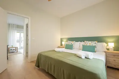 Cama o camas de una habitación en Bustos Tavera Central