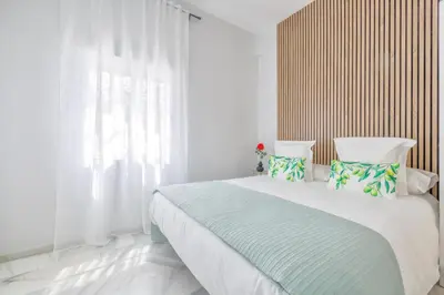 Cama o camas de una habitación en Apto Tendillas Centro Terraza - Oliva Suite